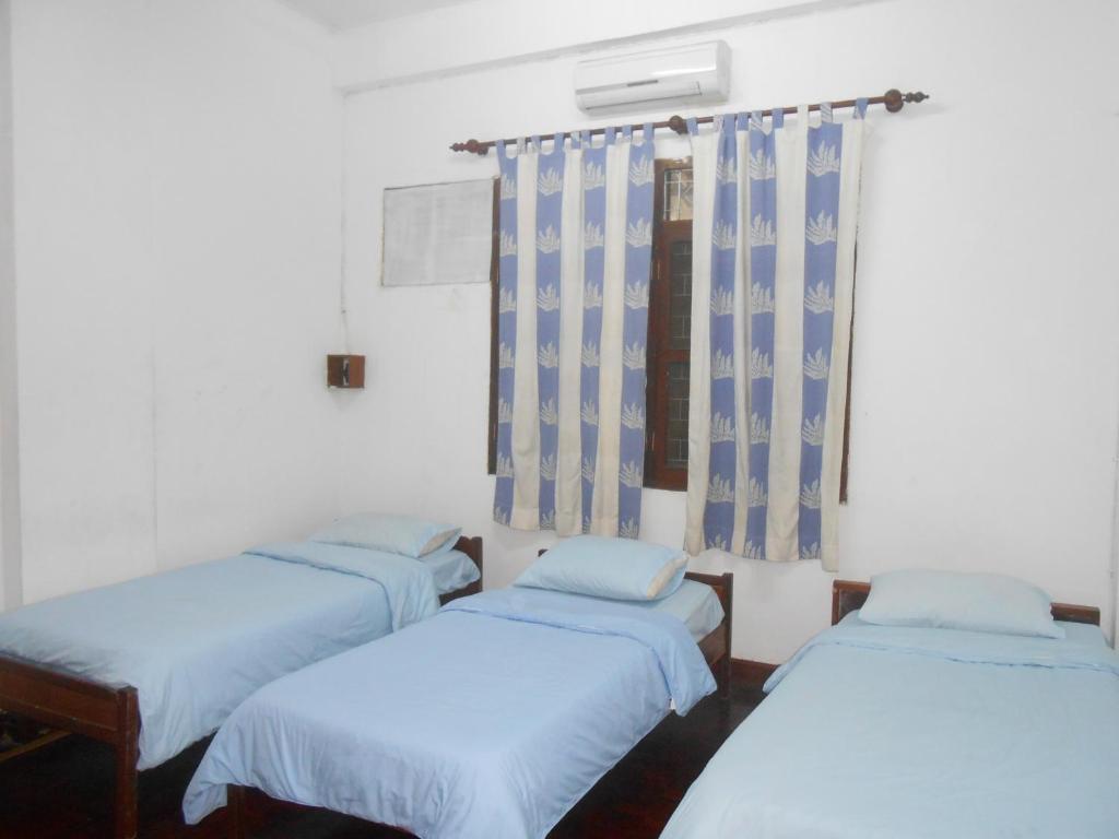 Saysouly Guesthouse Vientiane Zimmer foto
